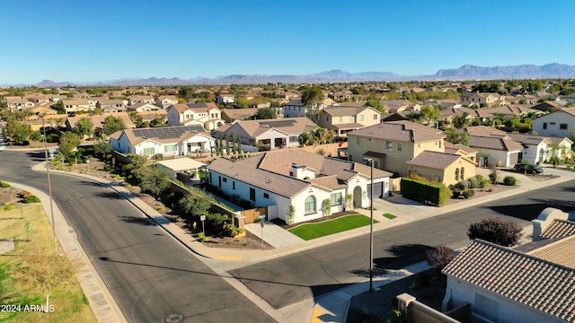 drone / aerial view featuring a mountain view