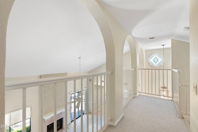 1338 E Greenway Cir, Mesa, AZ 85203 - hall with carpet floors and high vaulted ceiling