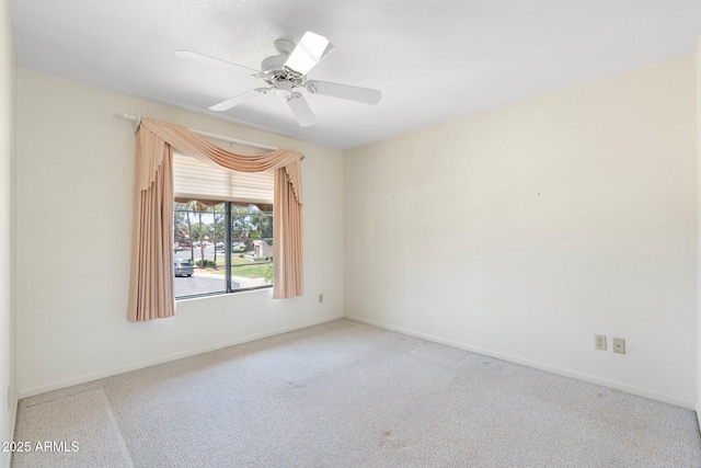 1338 E Greenway Cir, Mesa, AZ 85203 - carpeted empty room featuring baseboards and a ceiling fan