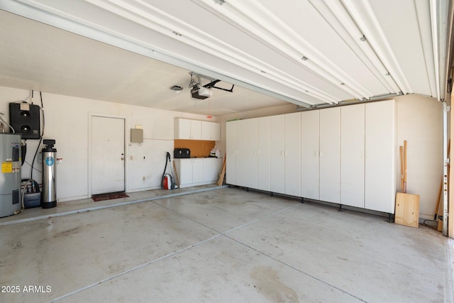 1338 E Greenway Cir, Mesa, AZ 85203 - garage with a garage door opener and water heater