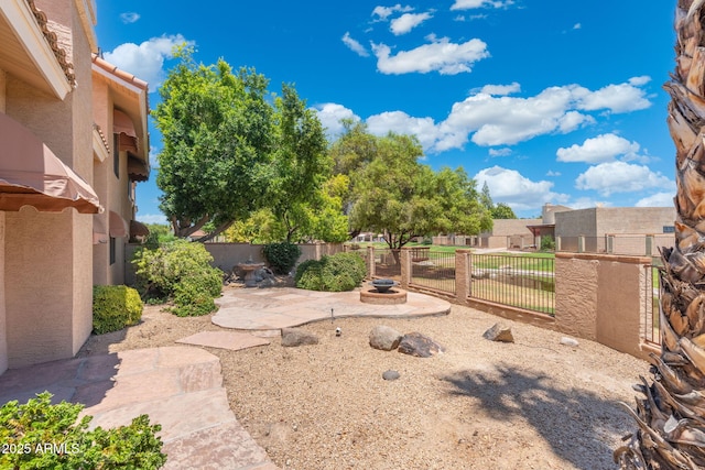 1338 E Greenway Cir, Mesa, AZ 85203 - fenced yard featuring a patio