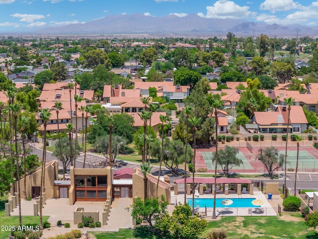 1338 E Greenway Cir, Mesa, AZ 85203 - aerial perspective of suburban area with a mountain backdrop and a pool area