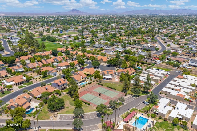 1338 E Greenway Cir, Mesa, AZ 85203 - aerial perspective of suburban area with a mountainous background