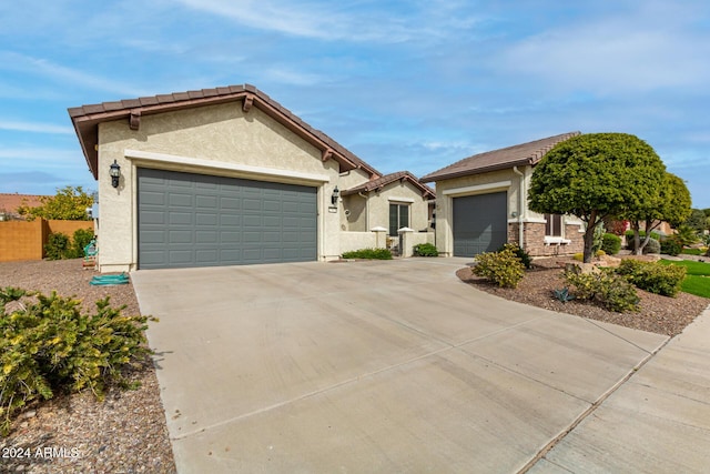 view of front of property with a garage