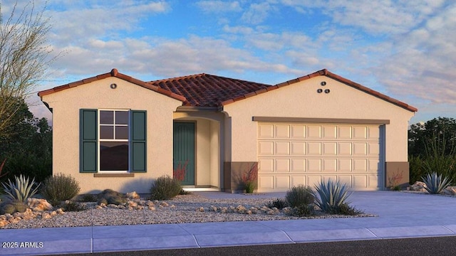 view of front of home with a garage