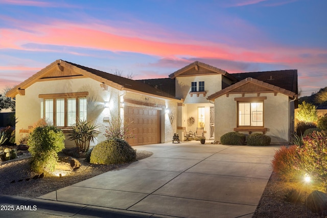 view of front of property with a garage