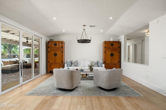 5112 N 41st St, Phoenix, AZ 85018 - living area featuring wood finished floors, lofted ceiling, a ceiling fan, baseboards, and recessed lighting