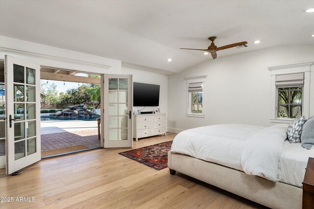 5112 N 41st St, Phoenix, AZ 85018 - bedroom with french doors, access to exterior, light wood finished floors, multiple windows, and lofted ceiling