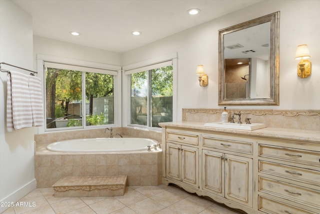 5112 N 41st St, Phoenix, AZ 85018 - full bath featuring vanity, a garden tub, tile patterned floors, and recessed lighting