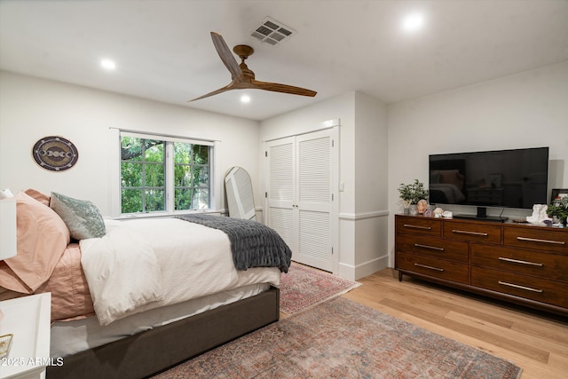 5112 N 41st St, Phoenix, AZ 85018 - bedroom with light wood-type flooring, recessed lighting, a closet, a ceiling fan, and baseboards