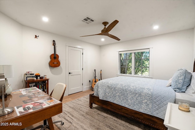 5112 N 41st St, Phoenix, AZ 85018 - bedroom featuring recessed lighting, wood finished floors, an office area, and ceiling fan