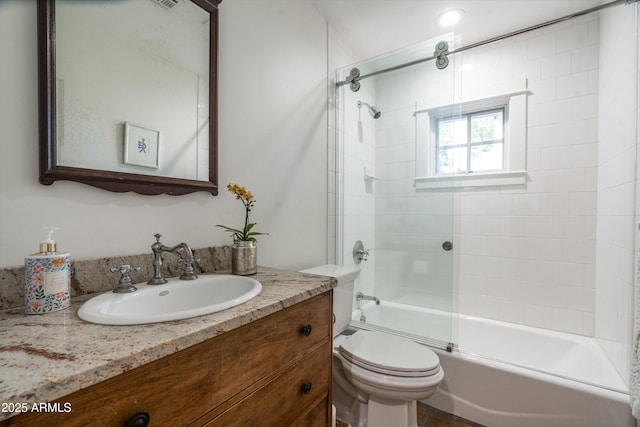 5112 N 41st St, Phoenix, AZ 85018 - full bathroom with vanity, bath / shower combo with glass door, and toilet