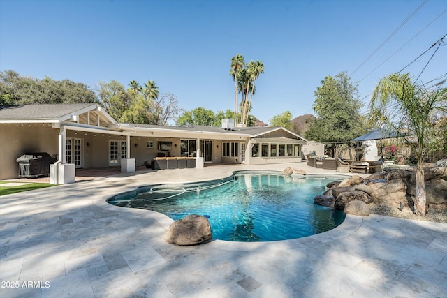 5112 N 41st St, Phoenix, AZ 85018 - swimming pool featuring french doors, a patio, a hot tub, an outdoor living space, and area for grilling