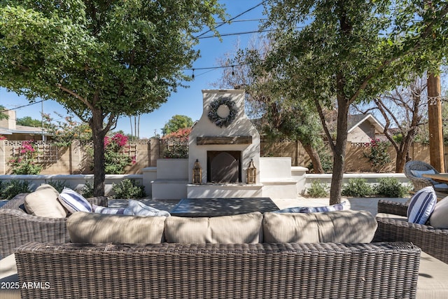 5112 N 41st St, Phoenix, AZ 85018 - view of patio / terrace featuring an outdoor living space with a fireplace