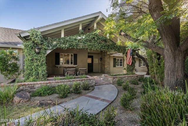 5112 N 41st St, Phoenix, AZ 85018 - view of front facade featuring stucco siding and stone siding