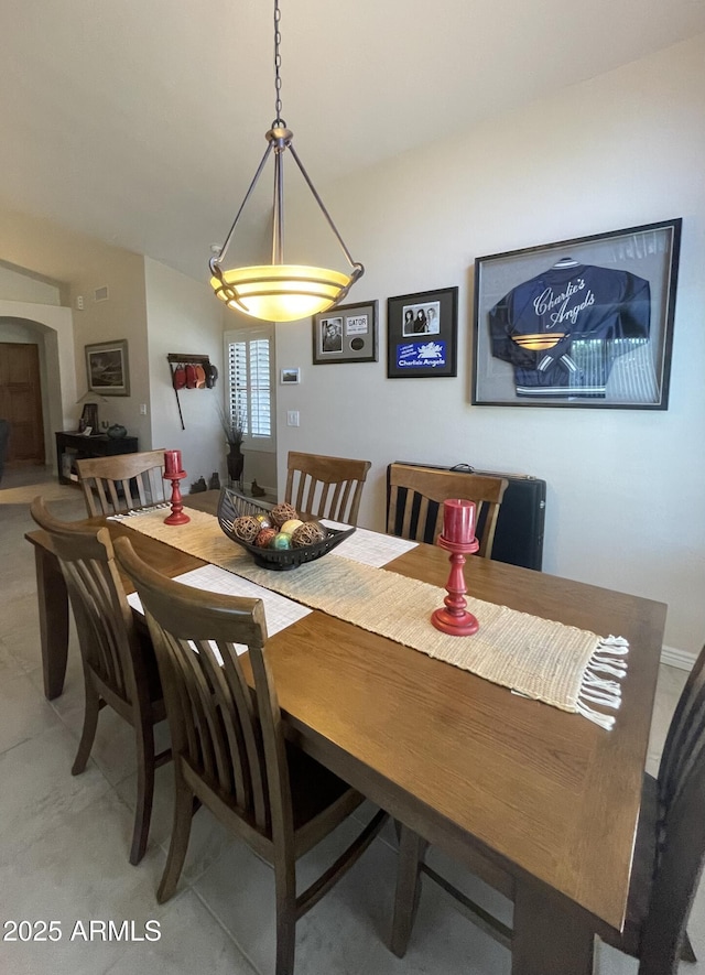 9807 W Mcrae Way, Peoria, AZ 85382 - dining room featuring lofted ceiling and arched walkways