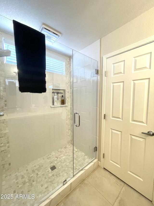 9807 W Mcrae Way, Peoria, AZ 85382 - bathroom featuring a wealth of natural light, visible vents, and a shower stall