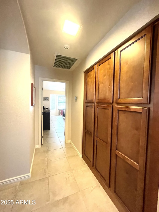9807 W Mcrae Way, Peoria, AZ 85382 - corridor with baseboards, visible vents, and light tile patterned flooring