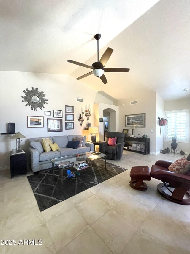 9807 W Mcrae Way, Peoria, AZ 85382 - tiled living area with arched walkways, visible vents, a ceiling fan, and vaulted ceiling