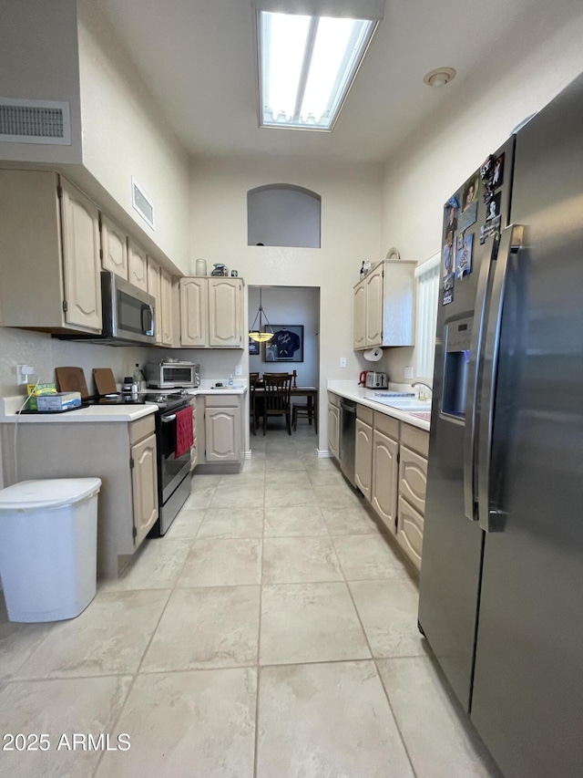 9807 W Mcrae Way, Peoria, AZ 85382 - kitchen featuring stainless steel appliances, light countertops, and visible vents
