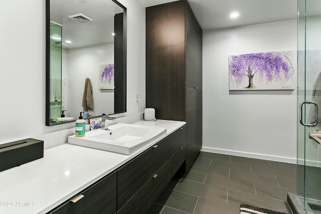 bathroom featuring vanity and walk in shower