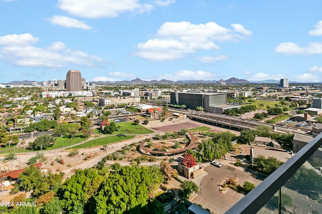 birds eye view of property with a mountain view