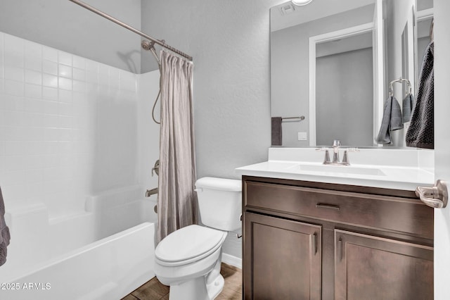 bathroom with vanity, shower / bath combo with shower curtain, toilet, visible vents, and wood finished floors