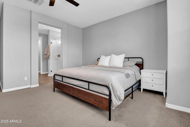 bedroom featuring a ceiling fan, visible vents, carpet floors, and baseboards