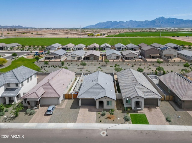 bird's eye view featuring a mountain view and a residential view