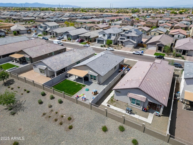 drone / aerial view featuring a mountain view and a residential view