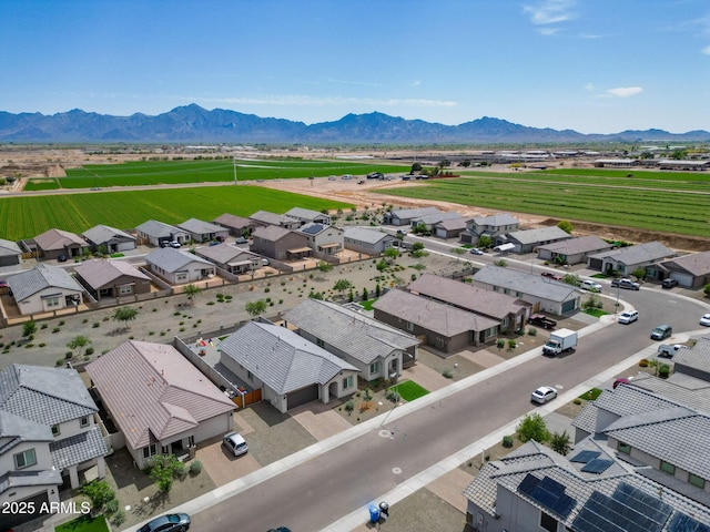 drone / aerial view featuring a mountain view and a residential view