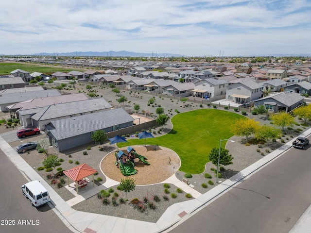 bird's eye view featuring a mountain view and a residential view