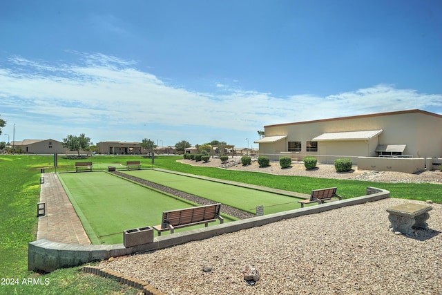 view of home's community featuring a yard