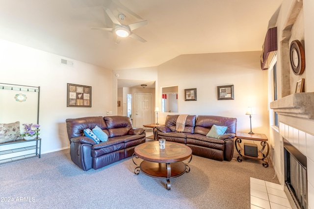 carpeted living room featuring ceiling fan and lofted ceiling