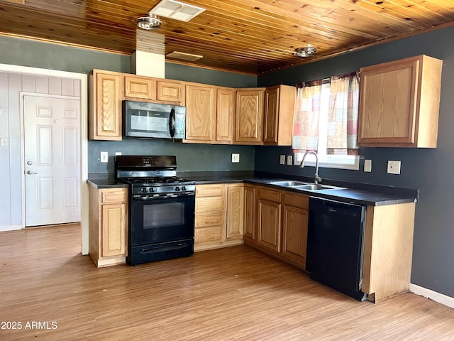 709 W Maple St, Winslow, AZ 86047 - kitchen with black appliances, a sink, dark countertops, light wood-type flooring, and wood ceiling