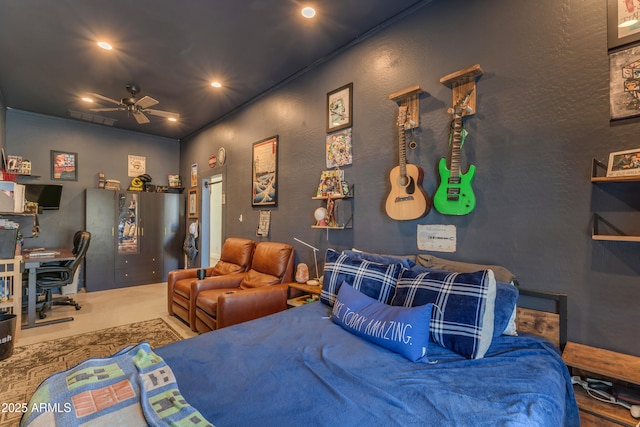 bedroom with recessed lighting, a textured wall, and visible vents