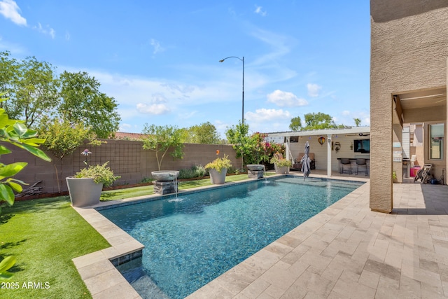 view of pool with a fenced backyard, a fenced in pool, and a patio