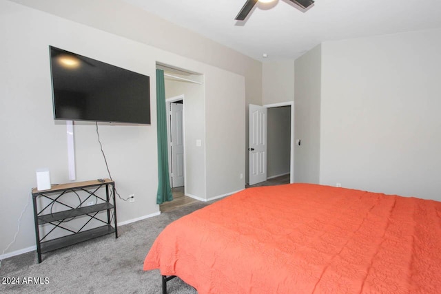 bedroom featuring ceiling fan and carpet