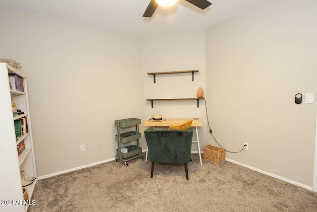 office area with light carpet and ceiling fan