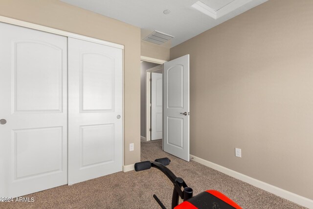 laundry area with washer and dryer and light tile patterned floors