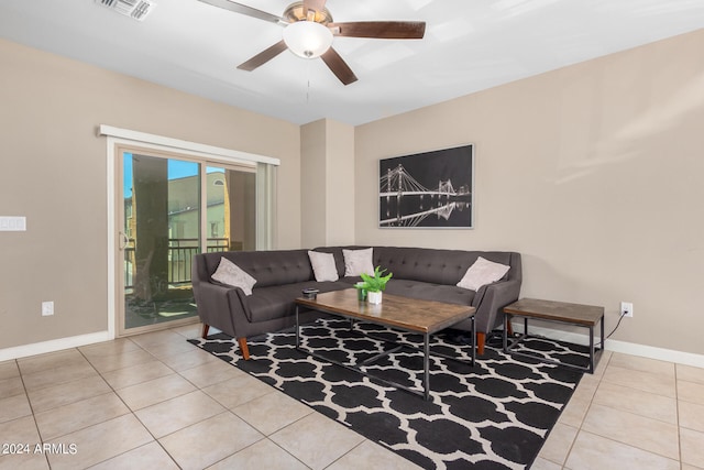 living room with light tile patterned floors and ceiling fan