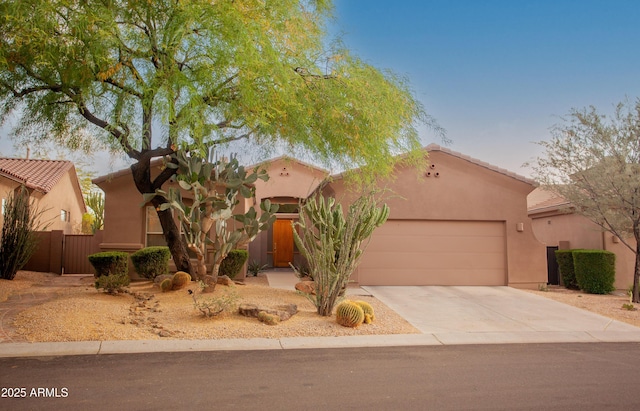 7413 E Russet Sky Dr, Scottsdale, AZ 85266 - view of front of house featuring concrete driveway, a garage, and stucco siding
