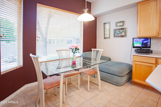 7413 E Russet Sky Dr, Scottsdale, AZ 85266 - dining room featuring healthy amount of natural light and light tile patterned floors