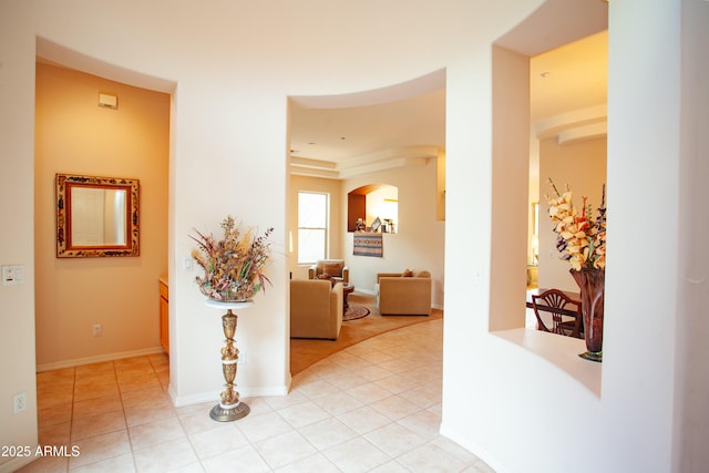 7413 E Russet Sky Dr, Scottsdale, AZ 85266 - hallway with light tile patterned floors and arched walkways