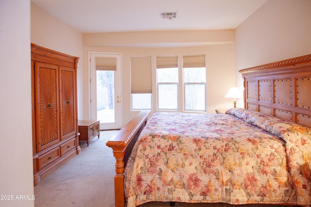 7413 E Russet Sky Dr, Scottsdale, AZ 85266 - bedroom featuring light colored carpet and access to exterior