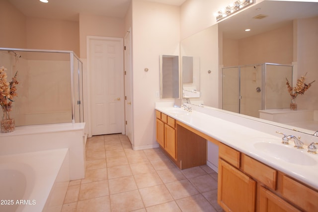 7413 E Russet Sky Dr, Scottsdale, AZ 85266 - bathroom with a stall shower, tile patterned floors, a garden tub, double vanity, and recessed lighting
