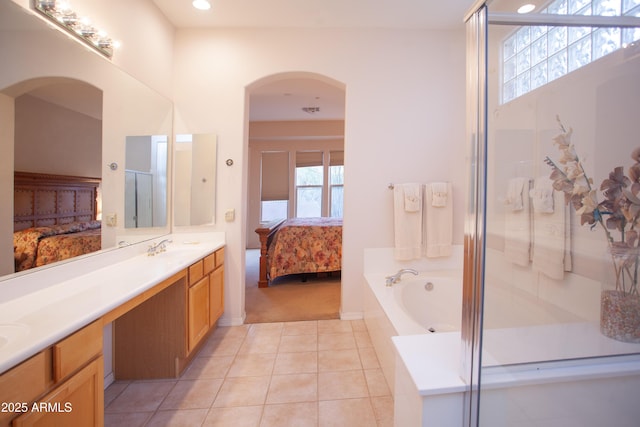 7413 E Russet Sky Dr, Scottsdale, AZ 85266 - full bathroom with ensuite bathroom, plenty of natural light, a shower stall, a bath, and recessed lighting