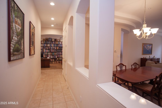 7413 E Russet Sky Dr, Scottsdale, AZ 85266 - hall with a chandelier, recessed lighting, light tile patterned floors, and baseboards