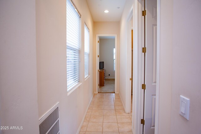 7413 E Russet Sky Dr, Scottsdale, AZ 85266 - hall with light tile patterned floors and baseboards