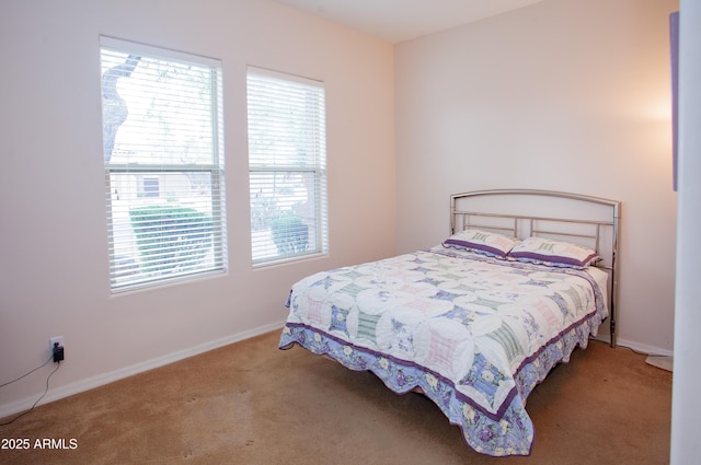 7413 E Russet Sky Dr, Scottsdale, AZ 85266 - carpeted bedroom featuring baseboards